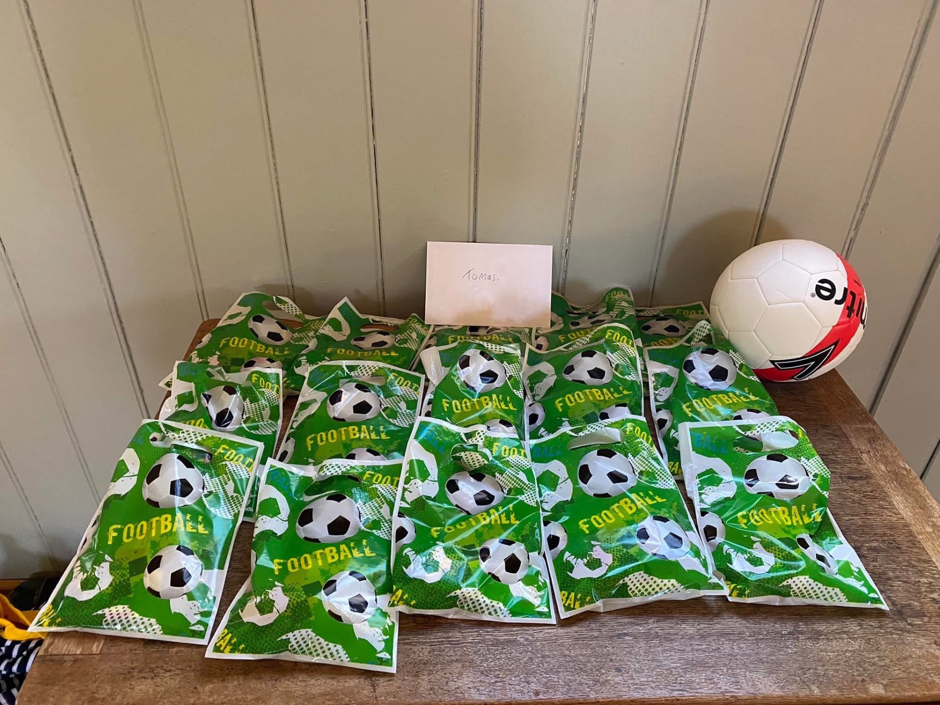 Football-themed party bags laid out ready for guests