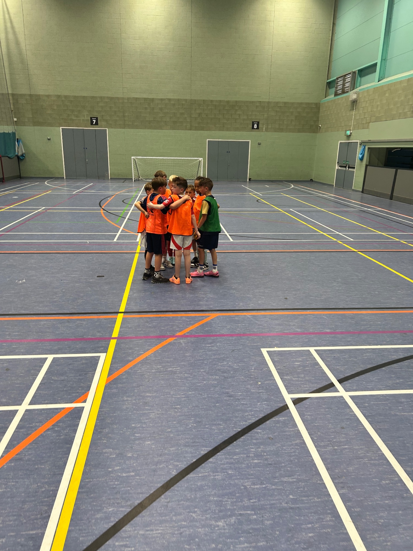 Mini huddle during a Discover Sports party