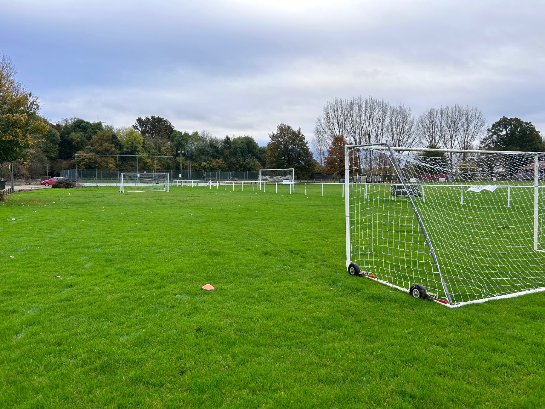 Outdoor grass football pitch with goals